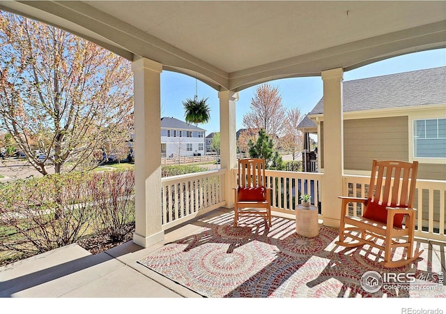 2927 Percheron Dr, Fort Collins, CO 80525 - view of patio / terrace with a residential view and covered porch