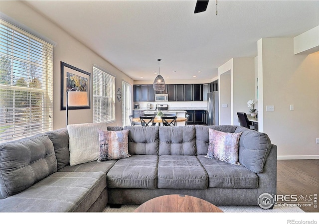 2927 Percheron Dr, Fort Collins, CO 80525 - living area with recessed lighting, baseboards, dark wood-style floors, and ceiling fan