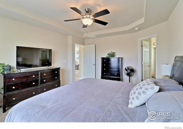 2927 Percheron Dr, Fort Collins, CO 80525 - bedroom featuring a raised ceiling, ceiling fan, and visible vents