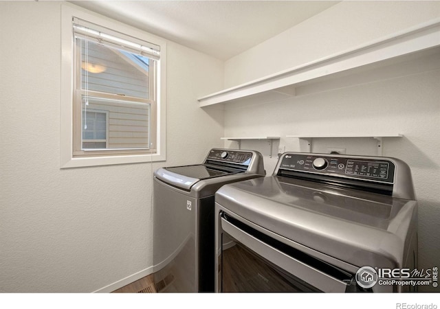 1532 Corydalis Ct, Fort Collins, CO 80526 - clothes washing area featuring separate washer and dryer