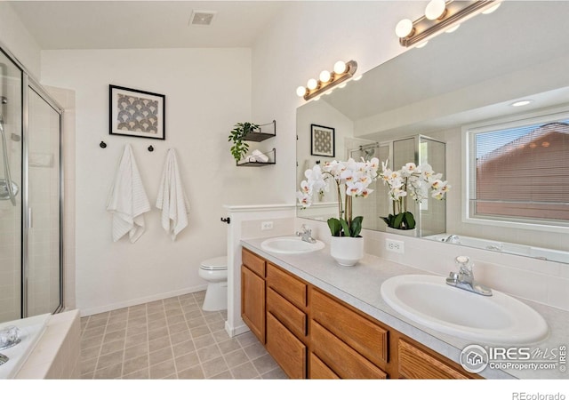 1532 Corydalis Ct, Fort Collins, CO 80526 - bathroom featuring tiled shower, double vanity, toilet, and a relaxing tiled tub