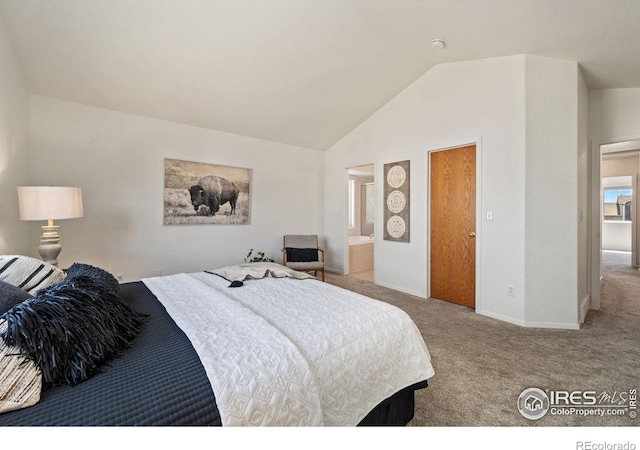 1532 Corydalis Ct, Fort Collins, CO 80526 - carpeted bedroom featuring baseboards, high vaulted ceiling, and ensuite bathroom