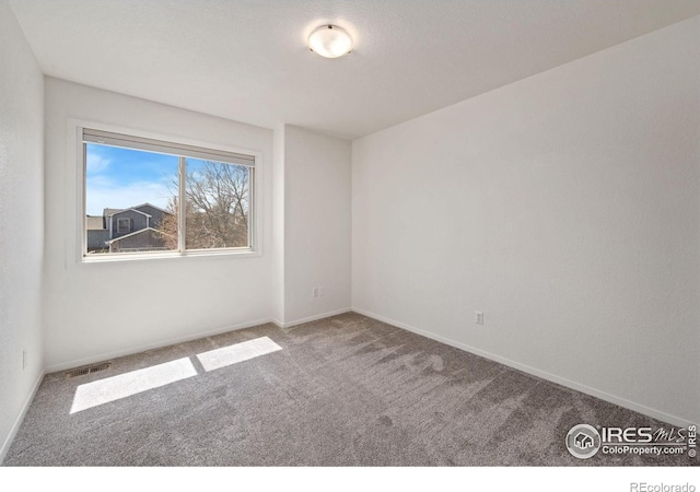 1532 Corydalis Ct, Fort Collins, CO 80526 - spare room featuring carpet floors and baseboards
