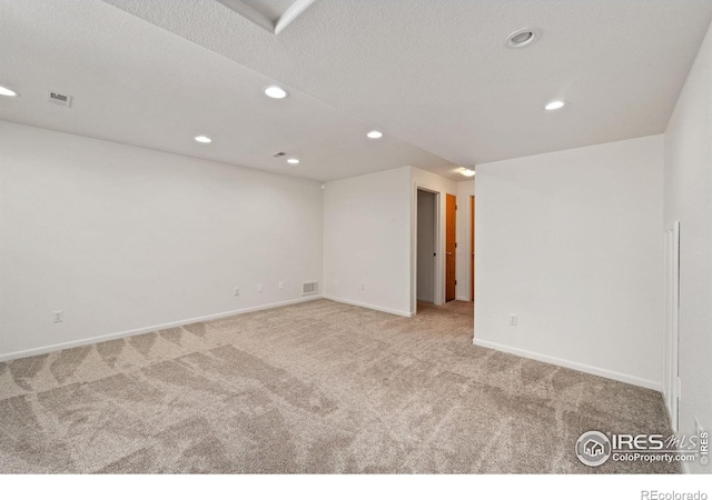 1532 Corydalis Ct, Fort Collins, CO 80526 - carpeted empty room with recessed lighting, baseboards, and a textured ceiling