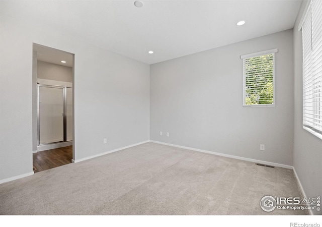 4672 Clear Creek Dr, Longmont, CO 80504 - empty room featuring carpet floors, baseboards, and recessed lighting