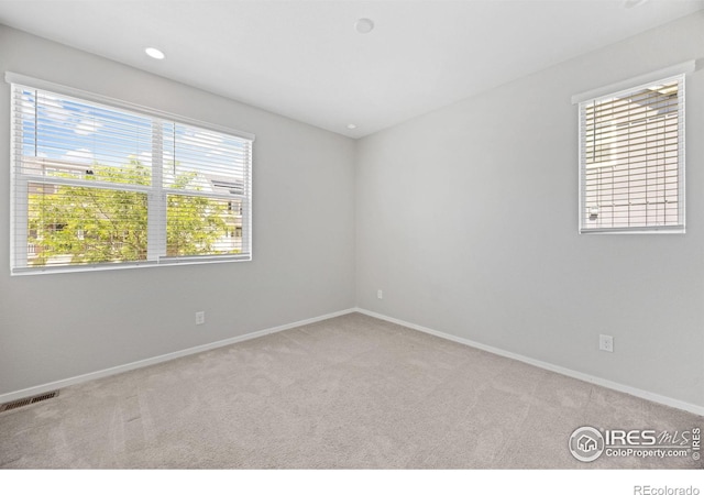 4672 Clear Creek Dr, Longmont, CO 80504 - carpeted empty room featuring baseboards