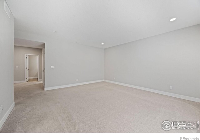 4672 Clear Creek Dr, Longmont, CO 80504 - unfurnished room featuring carpet floors, recessed lighting, and baseboards