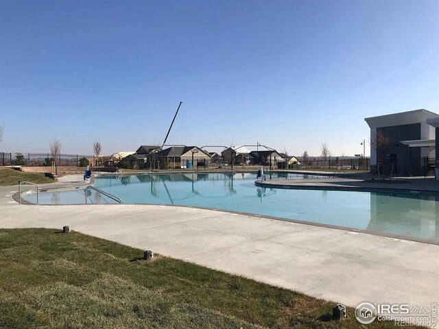 4672 Clear Creek Dr, Longmont, CO 80504 - community pool featuring a patio area