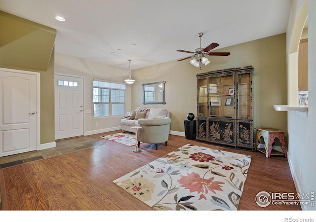 5775 29th St Unit 101, Greeley, CO 80634 - living room with baseboards, ceiling fan, recessed lighting, and wood finished floors
