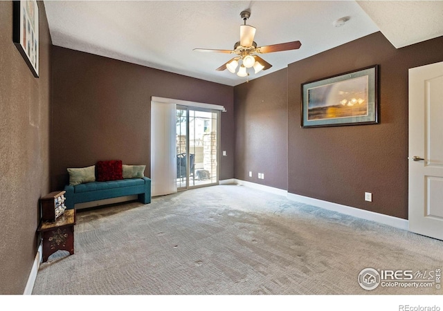 5775 29th St Unit 101, Greeley, CO 80634 - unfurnished room with carpet floors, a ceiling fan, and baseboards