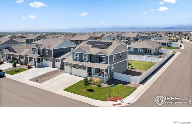 drone / aerial view with a residential view