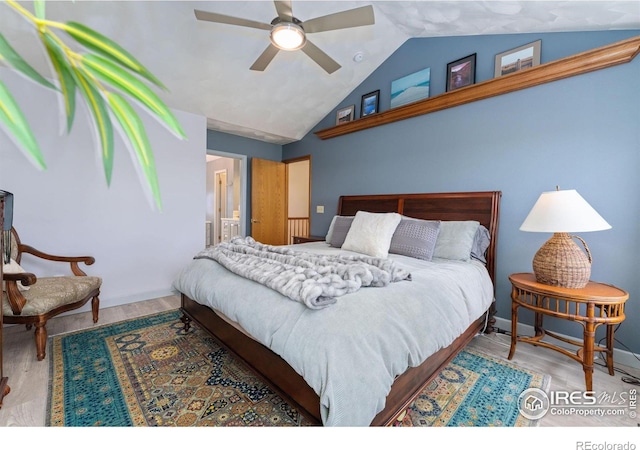 bedroom featuring wood finished floors, ceiling fan, and vaulted ceiling