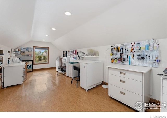 clothes washing area featuring laundry area, light wood-style flooring, and recessed lighting