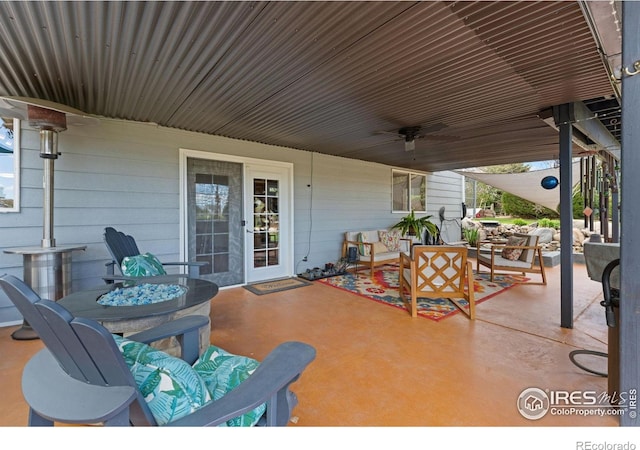 view of patio / terrace featuring ceiling fan and outdoor lounge area