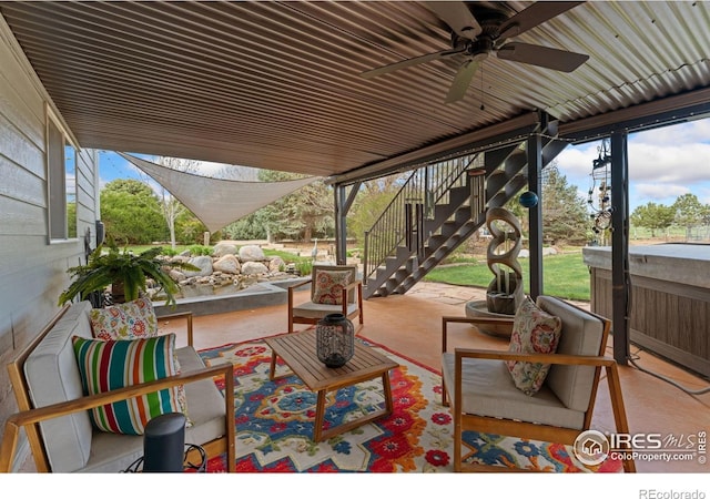 view of patio with outdoor lounge area, stairway, and ceiling fan