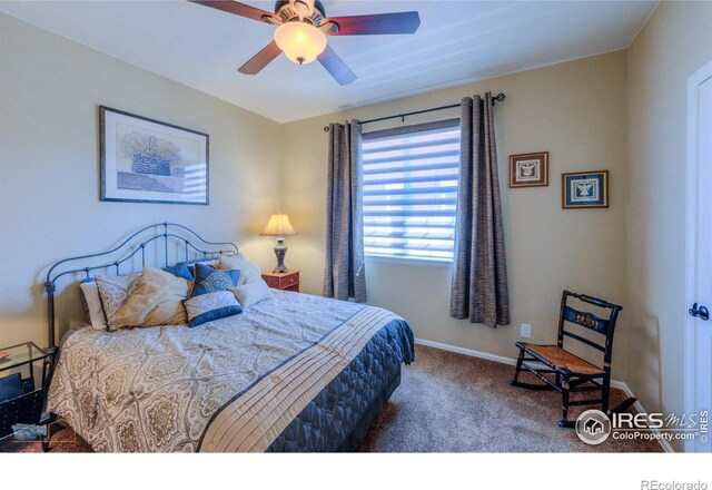 bedroom featuring carpet floors, baseboards, and ceiling fan