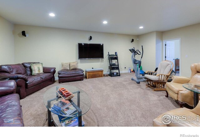 living room with recessed lighting and carpet flooring