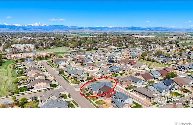 bird's eye view featuring a residential view and a mountain view