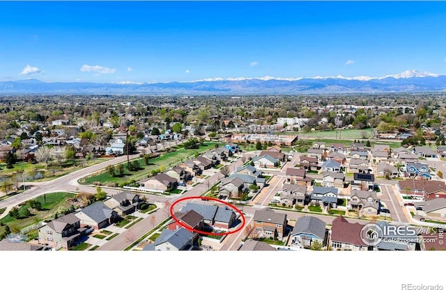 aerial view with a residential view and a mountain view