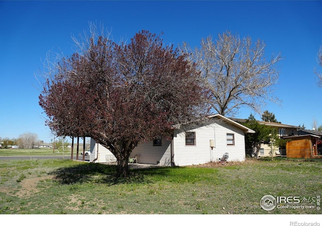 910 H Ave, Limon, CO 80828 - view of home's exterior featuring a yard