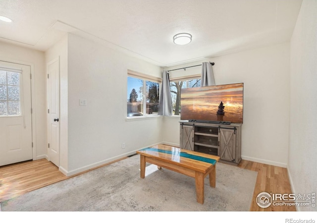 113 Balsam St, Fort Morgan, CO 80701 - interior space with baseboards and wood finished floors
