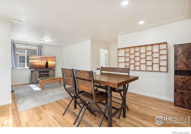 113 Balsam St, Fort Morgan, CO 80701 - dining space featuring recessed lighting, baseboards, and wood finished floors