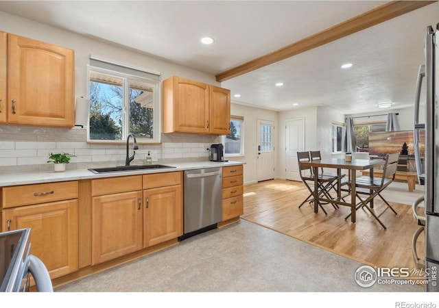 113 Balsam St, Fort Morgan, CO 80701 - kitchen with recessed lighting, a sink, plenty of natural light, and appliances with stainless steel finishes