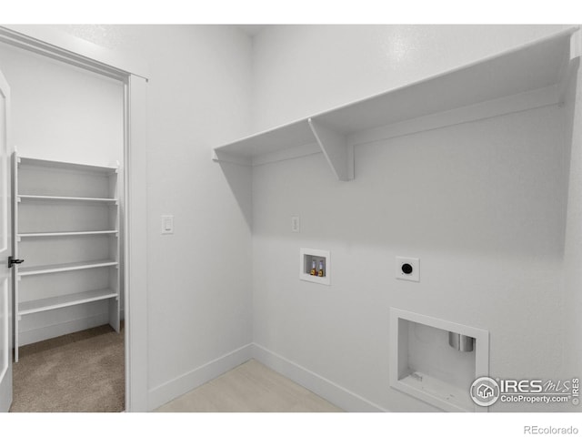 laundry room featuring baseboards, laundry area, electric dryer hookup, and hookup for a washing machine