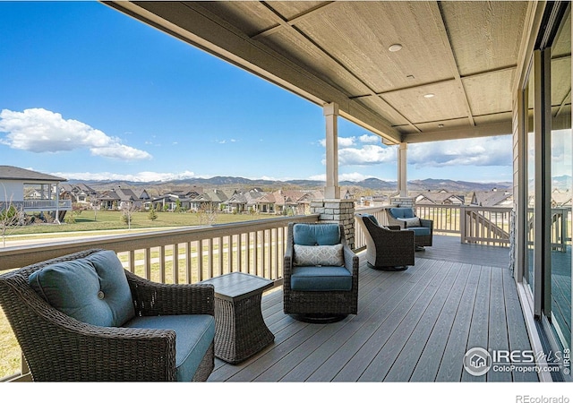 3295 Heron Lakes Pkwy, Berthoud, CO 80513 - wooden terrace featuring a mountain view and a residential view