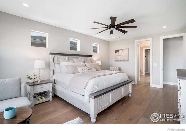 3295 Heron Lakes Pkwy, Berthoud, CO 80513 - bedroom featuring recessed lighting, a ceiling fan, baseboards, and wood finished floors