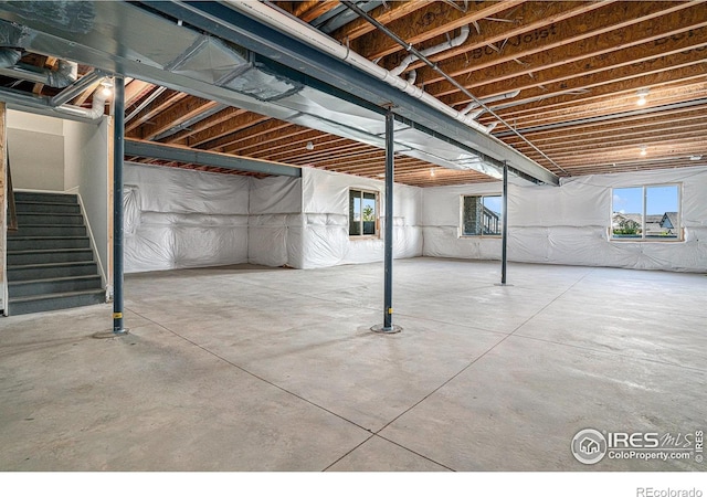 3295 Heron Lakes Pkwy, Berthoud, CO 80513 - basement featuring stairway