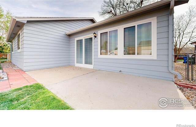 back of property with a patio area