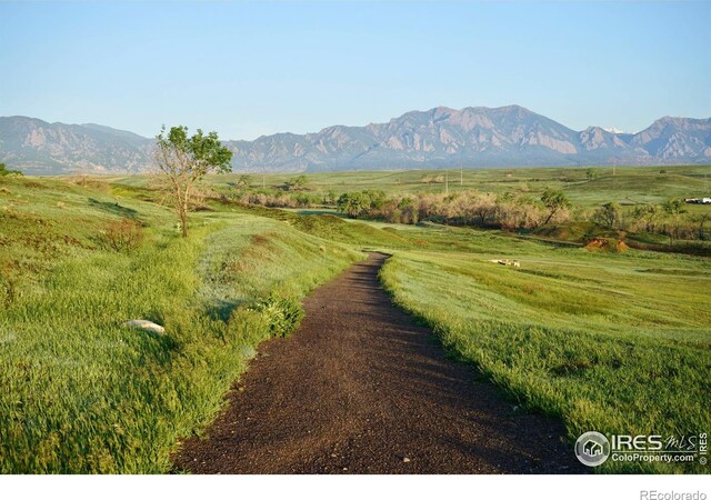 property view of mountains featuring a rural view