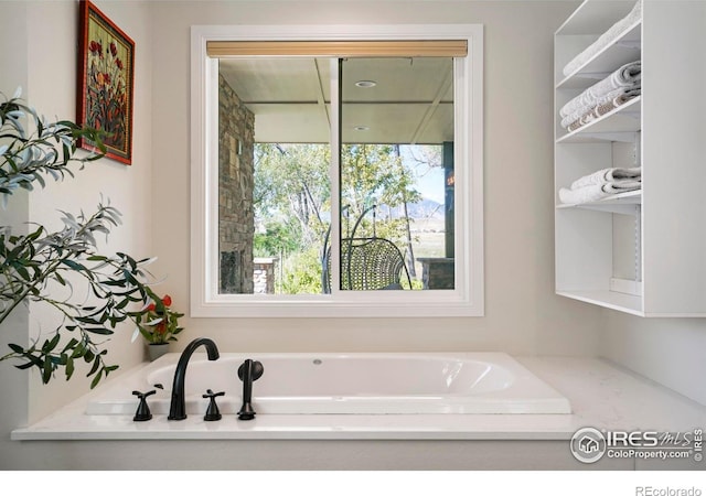 bathroom with a bath