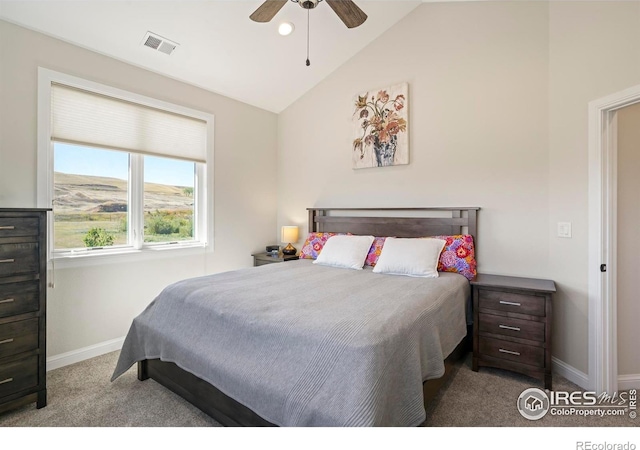 bedroom with ceiling fan, carpet floors, baseboards, vaulted ceiling, and visible vents