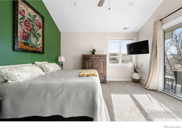 carpeted bedroom with access to outside, baseboards, visible vents, and lofted ceiling