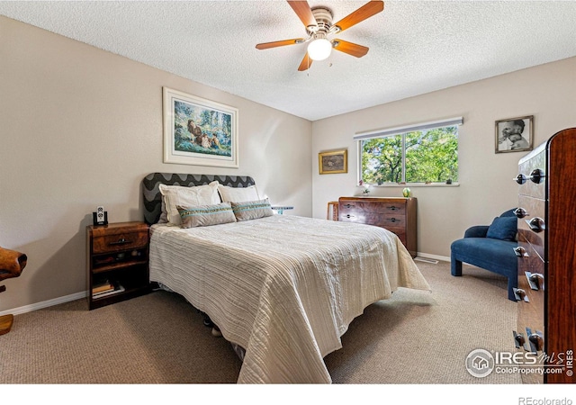 bedroom with carpet floors, a ceiling fan, and baseboards