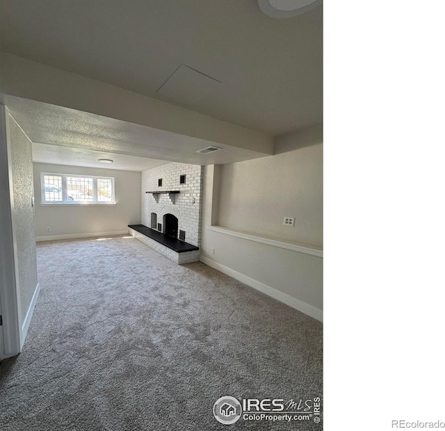 2221 E 84th Ave, Denver, CO 80229 - unfurnished living room featuring carpet, a fireplace, and baseboards