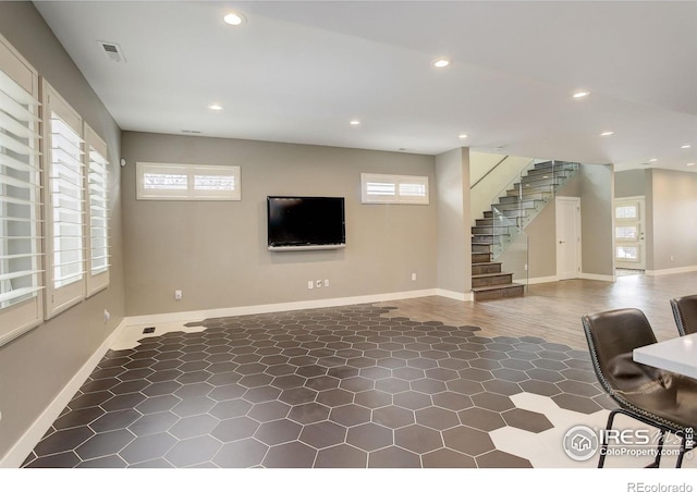 2624 S Race St, Denver, CO 80210 - unfurnished living room featuring baseboards, stairs, and recessed lighting