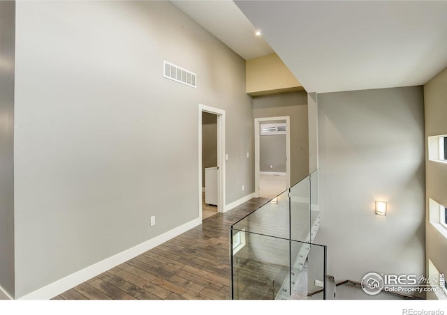 2624 S Race St, Denver, CO 80210 - hallway with wood finished floors, baseboards, and a high ceiling