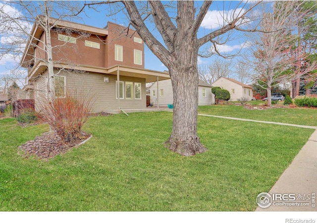 2624 S Race St, Denver, CO 80210 - view of front of property with a front lawn