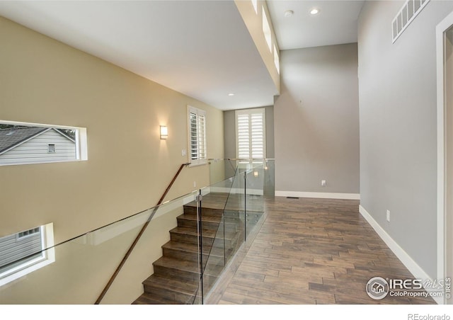 2624 S Race St, Denver, CO 80210 - stairway with wood finished floors, baseboards, and recessed lighting