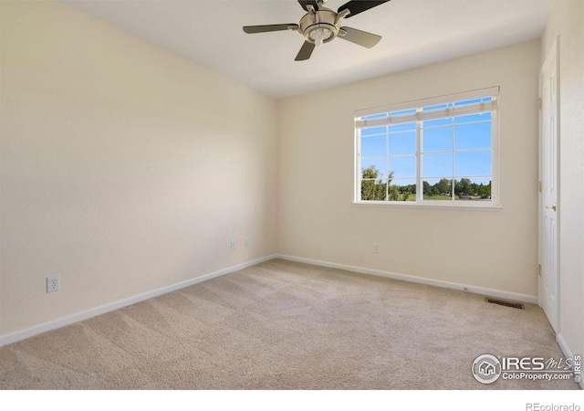 2120 Timber Creek Dr Unit H4, Fort Collins, CO 80528 - carpeted spare room with baseboards, a ceiling fan, and visible vents
