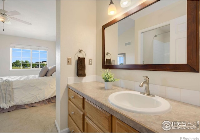2120 Timber Creek Dr Unit H4, Fort Collins, CO 80528 - ensuite bathroom featuring vanity, a ceiling fan, ensuite bath, and visible vents