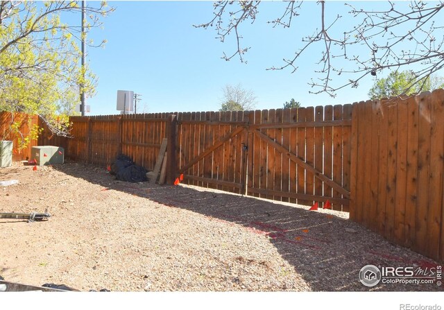 1021 Pinyon Dr, Windsor, CO 80550 - view of yard featuring a fenced backyard