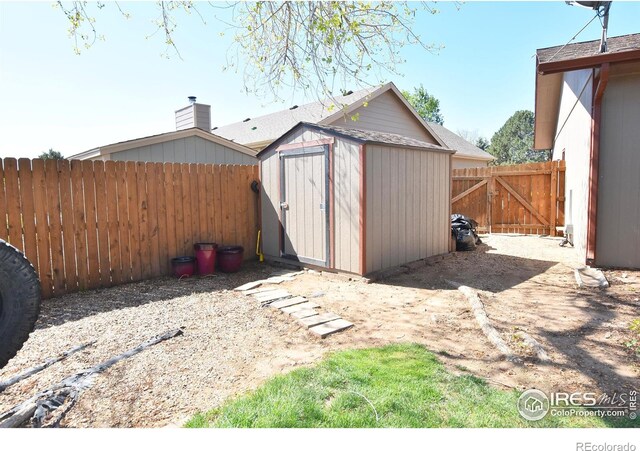 1021 Pinyon Dr, Windsor, CO 80550 - view of shed featuring a fenced backyard