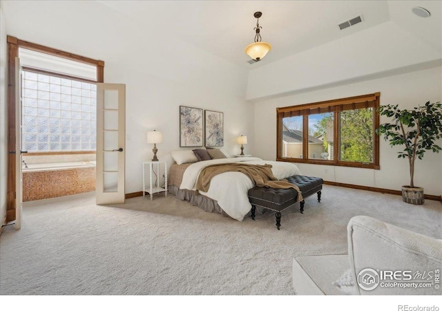 carpeted bedroom with baseboards and visible vents