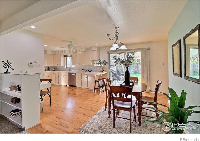 821 36th Ave, Greeley, CO 80634 - dining area with light wood-type flooring, healthy amount of natural light, recessed lighting, and ceiling fan