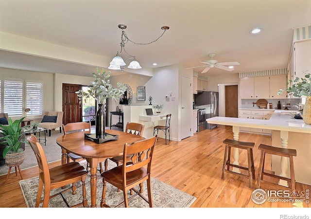 821 36th Ave, Greeley, CO 80634 - dining room with light wood-type flooring, a ceiling fan, and recessed lighting