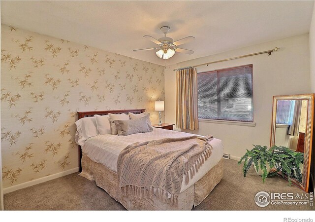 821 36th Ave, Greeley, CO 80634 - carpeted bedroom featuring baseboards, wallpapered walls, and ceiling fan